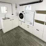 Hauswirtschaftsraum mit Waschmaschine, Trockner und Ausgussbecken